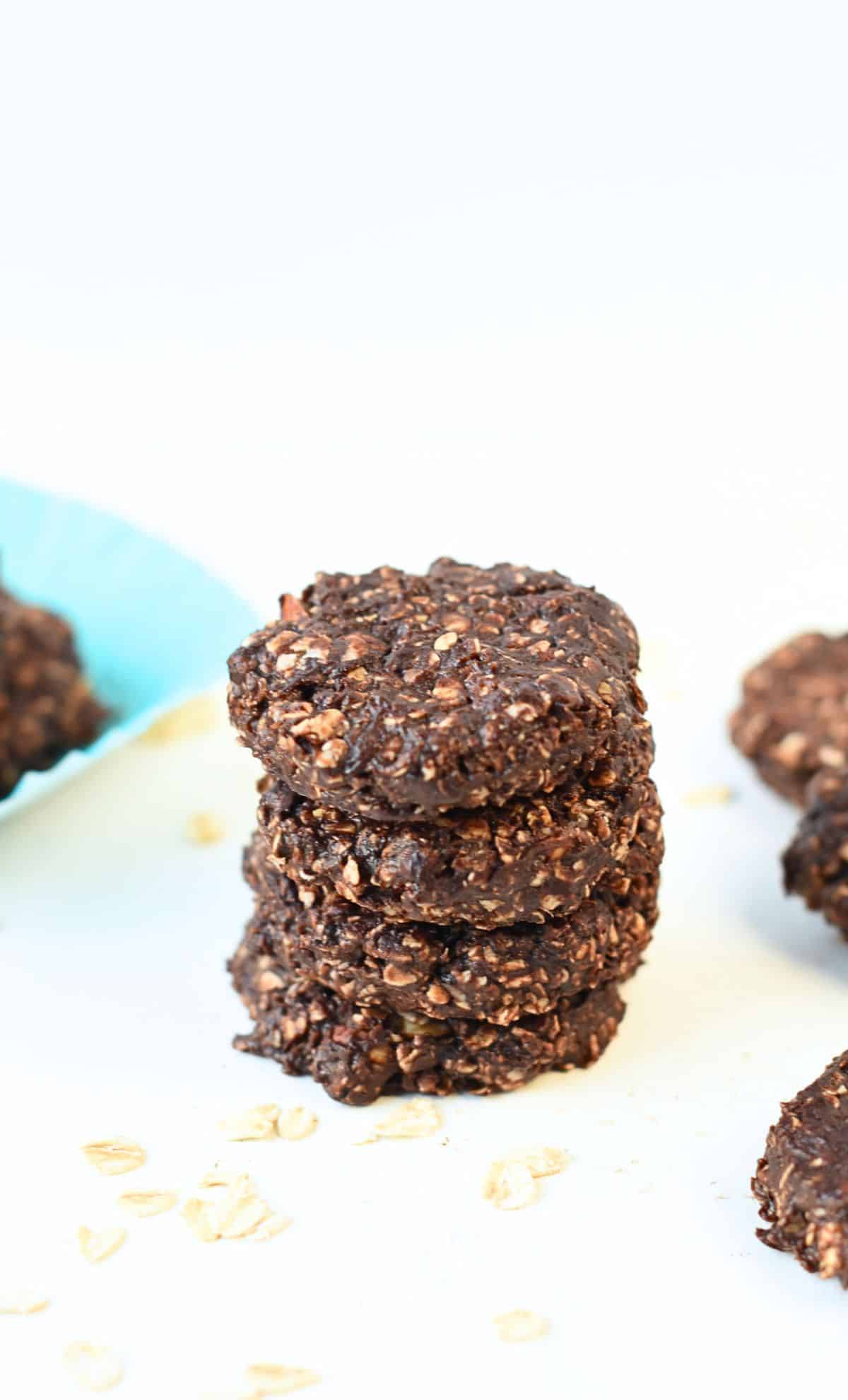 Healthy No-Bake Oatmeal Cookies stacked on a table.