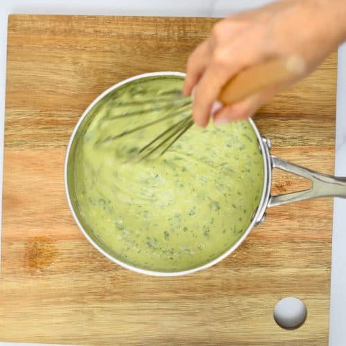 Stirring vegan alfredo sauce for Vegan Spaghetti Squash Alfredo