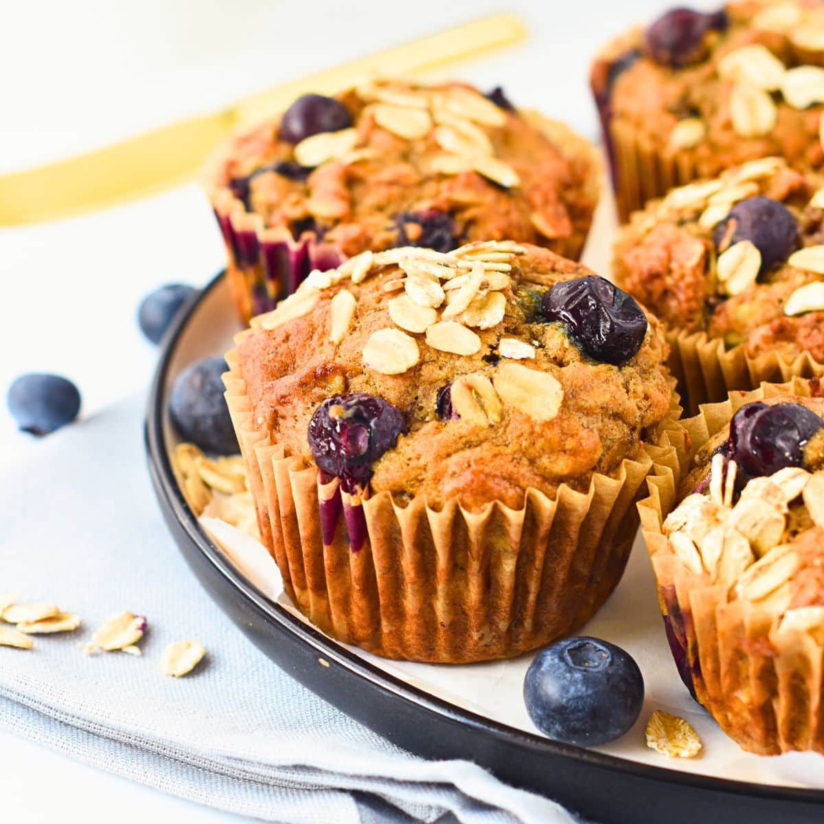 Vegan Banana Blueberry Muffins on a plate