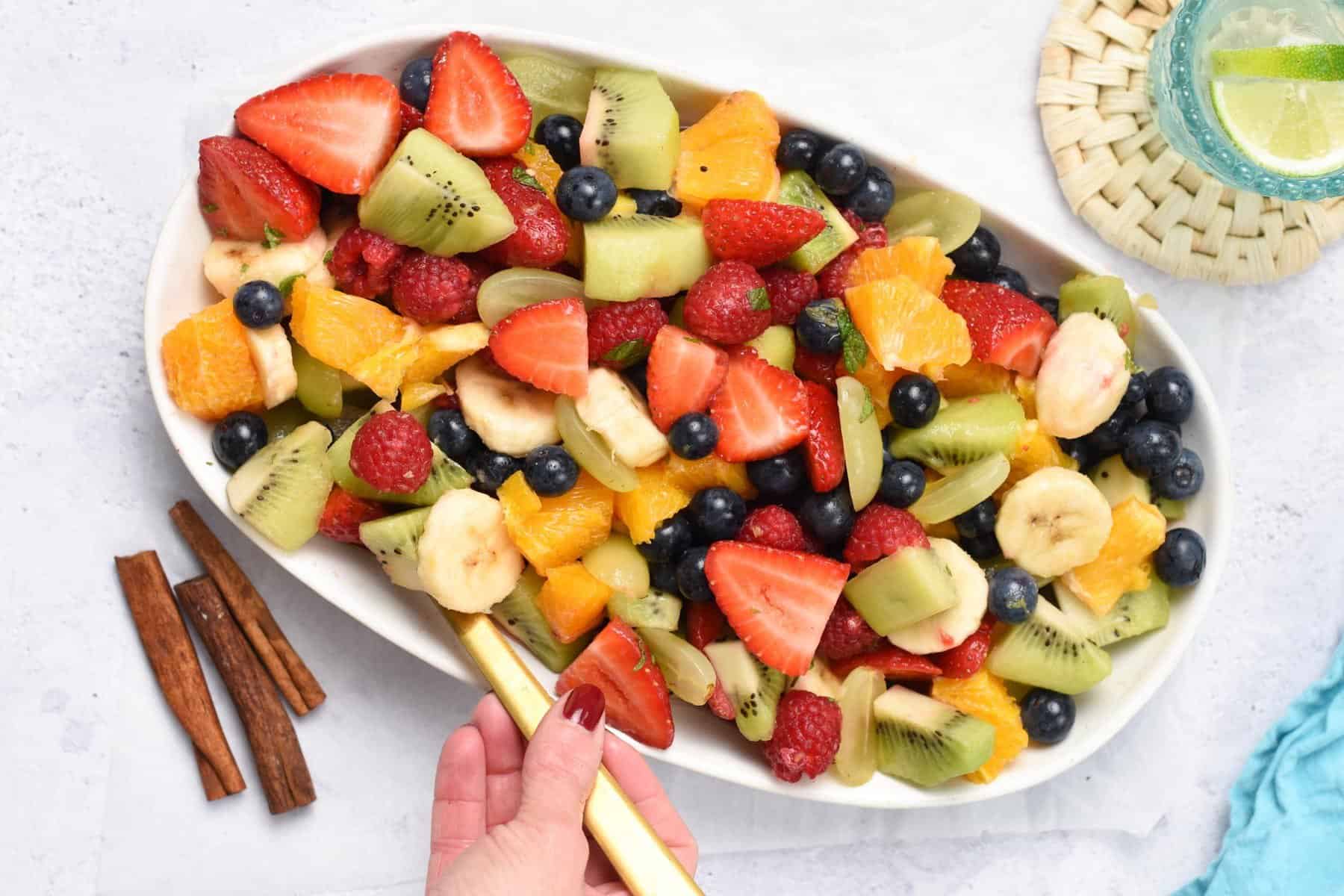 https://www.theconsciousplantkitchen.com/wp-content/uploads/2022/05/Breakfast-Fruit-Salad-1-rotated.jpg
