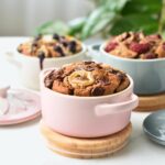 High Protein Baked Oats in 3 cast-iron casseroles.