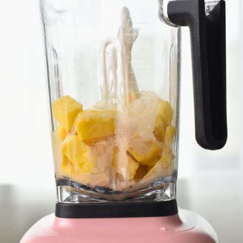 Protein Dole Whip ingredients in a blender.