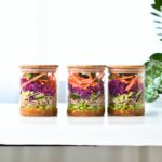 Vegan Soba Noodle Salad in three glass jars.