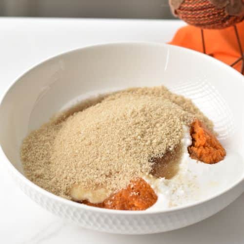 Wet 5-Ingredient Pumpkin Bread ingredients in a mixing bowl.