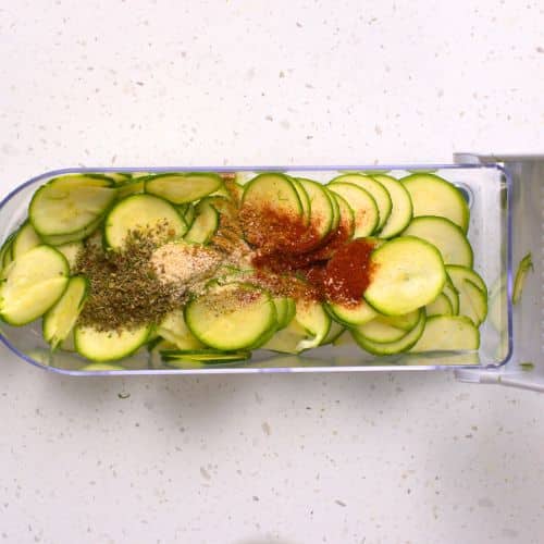 Sliced zucchini with spices.