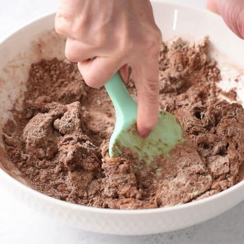 Brownie Protein Bar batter mixed with a spatula.