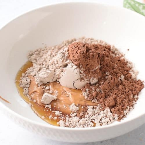 Brownie Protein Bar ingredients in a bowl.