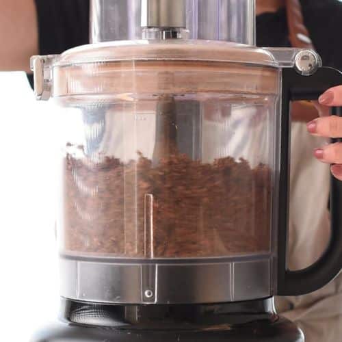 Processing the weetbix in a food processor.