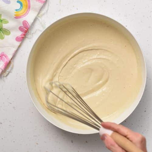 Pikelet batter stirred in a mixing bowl.