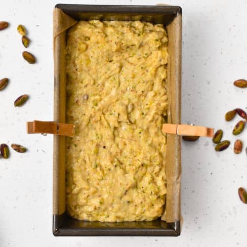 Pistachio Banana Bread dough in a pan.