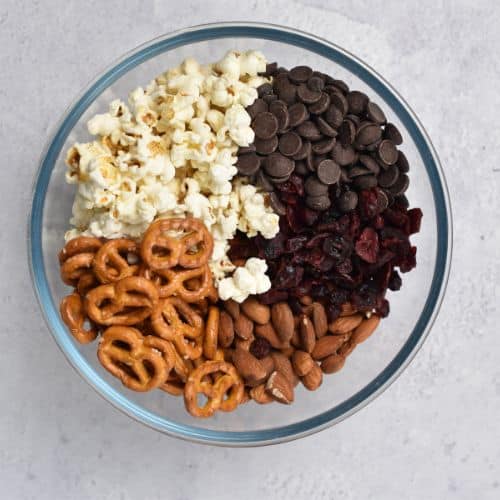 Popcorn Trail Mix ingredients in a bowl.