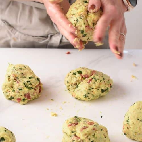 Rolling the Protein Biscuits dough.