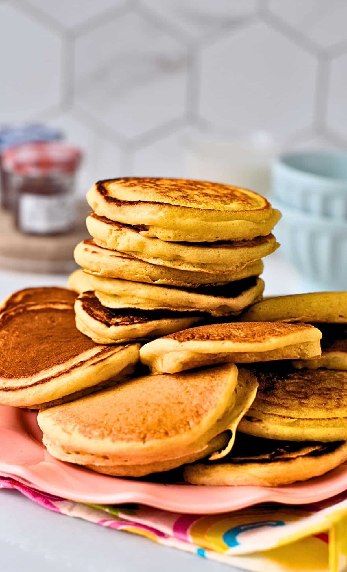 Pikelets stacked on a plate/