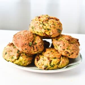 Protein Biscuits stacked on a plate.