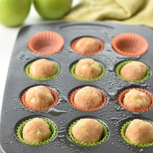 Apple Bites ready to bake in a muffin pan.