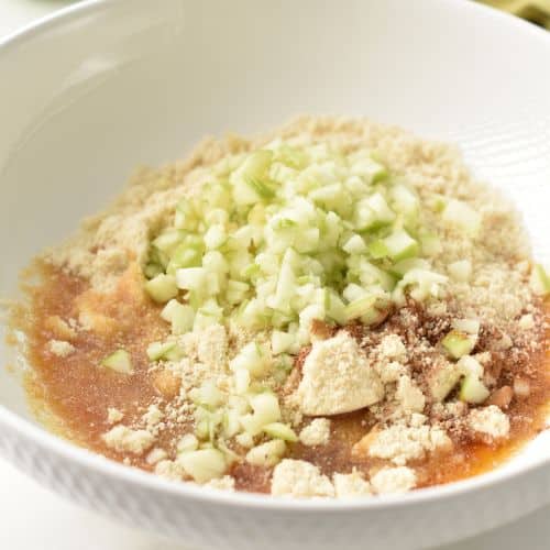 Apple Bites ingredients in a mixing bowl.