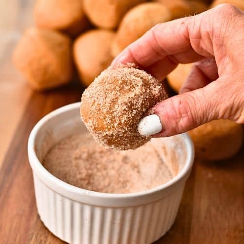 Rolled Apple Cider Donut Holes in cinnamon sugar.