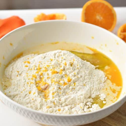 Orange Scones ingredients in a mixing bowl.