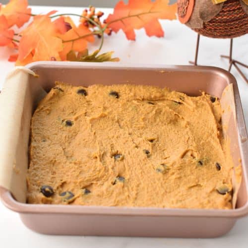 Pumpkin Blondies batter in a square pan