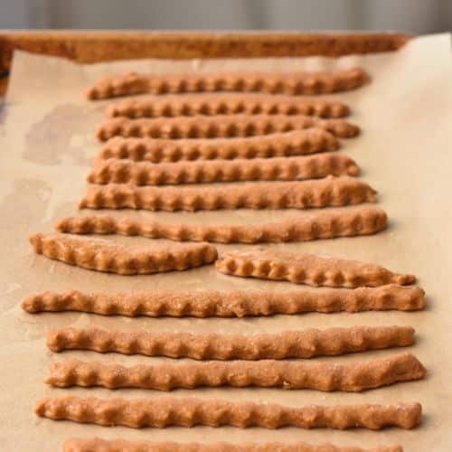 Pumpkin Stick Cookies on a baking sheet.