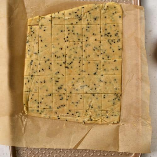 Almond Flour Crackers ready to bake on a baking sheet.