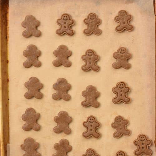 Almond Flour Gingerbread Cookies ready to bake on a baking sheet.