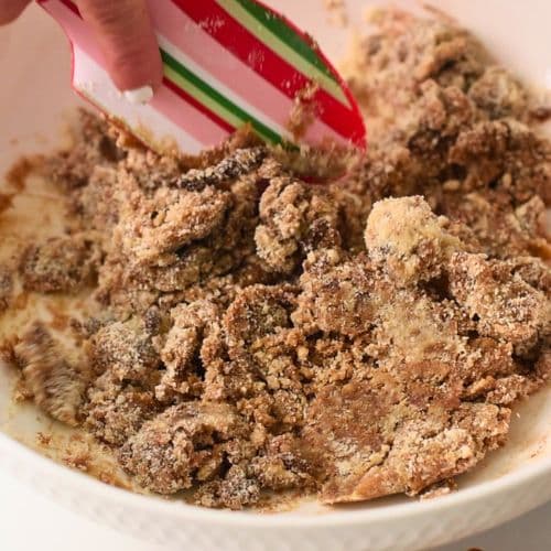 Stirring Almond Flour Gingerbread Cookies dough.