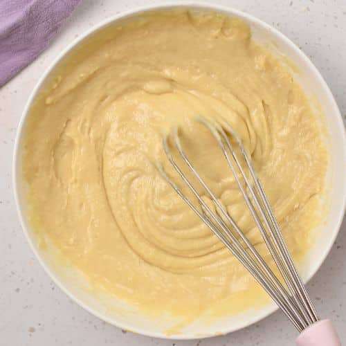 Easy Vanilla Muffin batter in a mixing bowl.