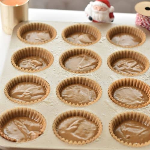 Gingerbread Cupcakes ready to bake in a muffin tray.