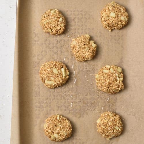 Healthy Apple Cookies ready to bake on a baking sheet.