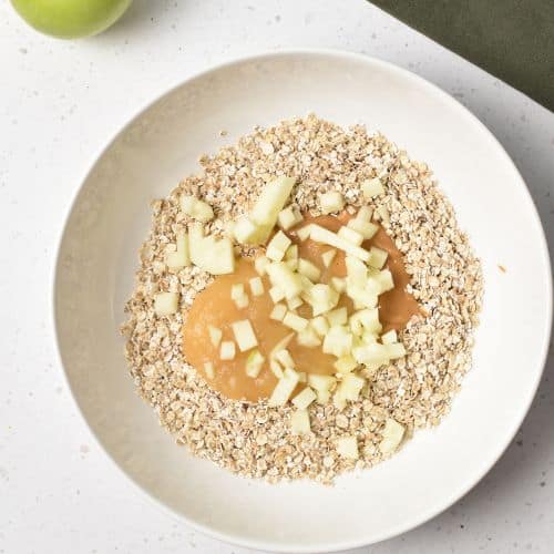 Ingredients for Healthy Apple Cookies in a mixing bowl.