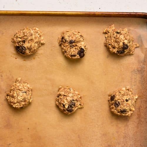 Healthy Breakfast Cookies ready to bake on a baking sheet.