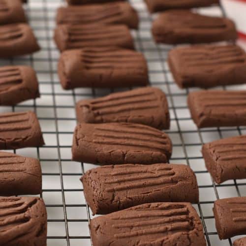 Chocolate Shortbread Cookies cooling down on a wire rack.