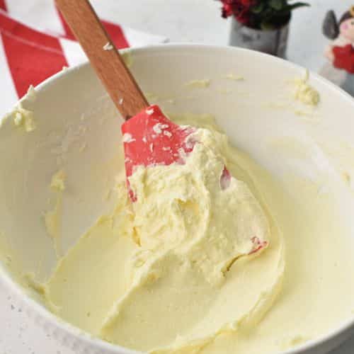 Combined dairy-free butter and powdered sugar in a bowl.