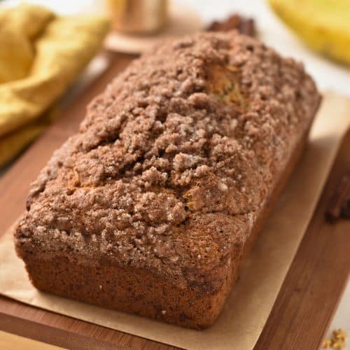 Baked Cinnamon Banana Bread on a chopping board.