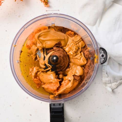 Ingredients for Healthy Brownie Bites in a mixing bowl.