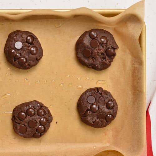 Healthy Chocolate Cookies ready to bake on a cookie sheet.