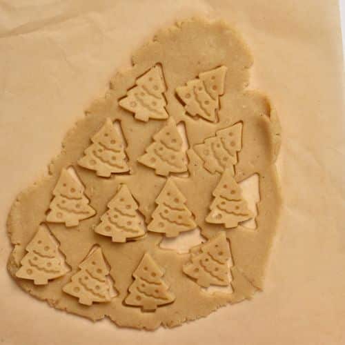 Cutout cookies formed on the Healthy Christmas Cookie dough.