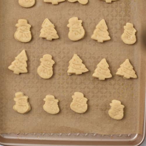 Healthy Sugar Cookies shapes on a baking sheet.