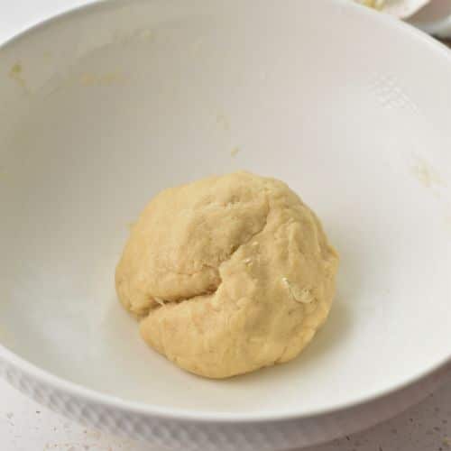 Healthy Sugar Cookie dough ball in a mixing bowl.