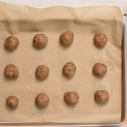 Maple Pecan Cookie dough balls on a baking sheet.