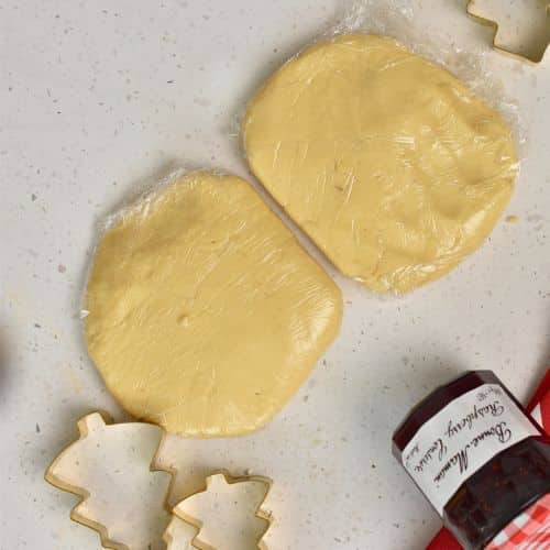 Jam Sandwich Cookie dough balls wrapped in plastic.