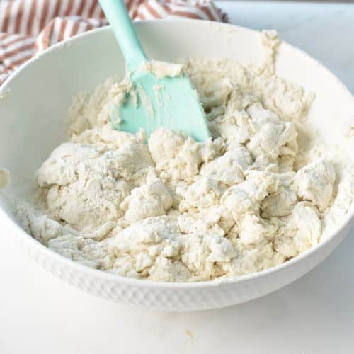 Mixing the 2-Ingredient Biscuit ingredients in a bowl.