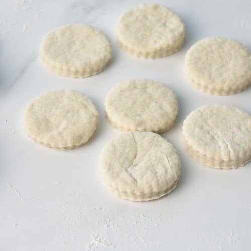 2-Ingredient Biscuit dough cut on a benchtop.