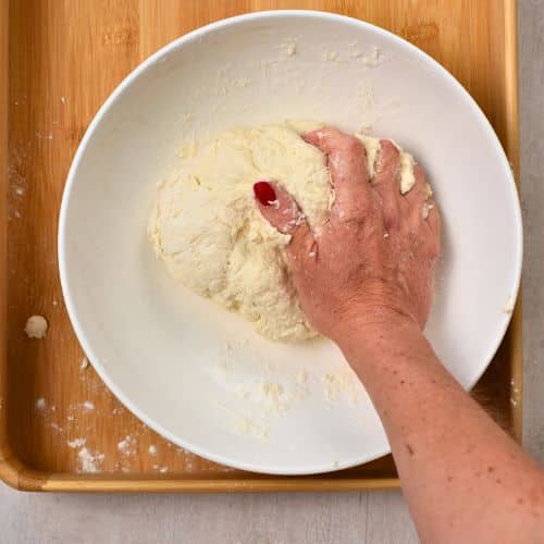 Kneading the 2-Ingredient Dough in a bowl.