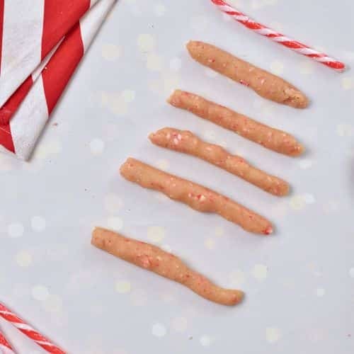 Almond Candy Cane Cookie dough formed into sticks.