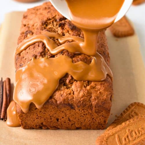 Pouring Biscoff mixture on the Biscoff Banana Bread.