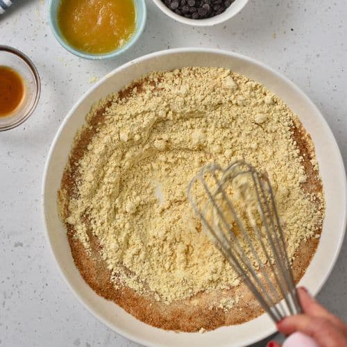 Mixing dry Chickpea Flour Cookie ingredients in a bowl.