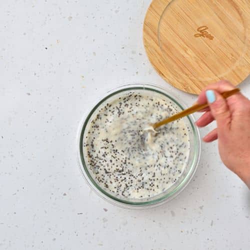 Mixing the Coconut Chia Pudding in a jar.