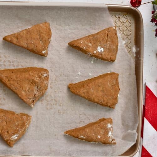 Gingerbread Scones ready to bake on a baking sheet.